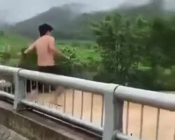 Guy commits suicide by jumping into swollen river