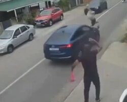 Struck by car right in front of her husband