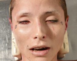Unidentified woman found dead on sidewalk