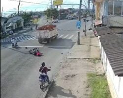 Female biker crashes at full speed into truck