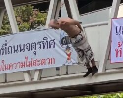 Foreigner jumps from pedestrian bridge in Bangkok