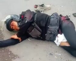 Two men on motorcycle hit by truck during dangerous maneuver