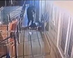 Man assassinated while holding infant in his arms