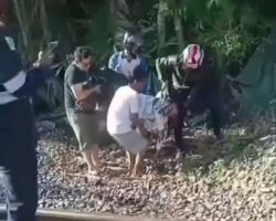 Man fatally struck by train at railway crossing