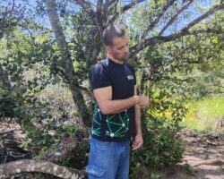 Man found hanged in wooded area
