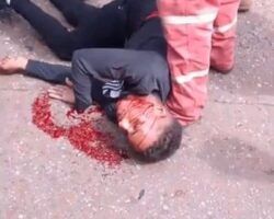 Motorcyclist lies dying after crashing sideways into pickup truck