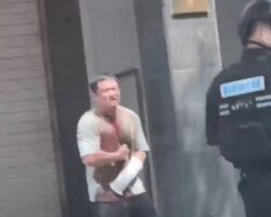 Psychotic man tries to slit his own throat in front of police officers