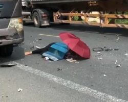 Two students on moped fatally crash with truck