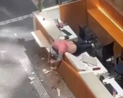 Worker died after falling through building roof