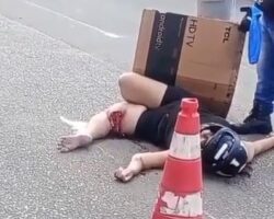 Aftermath of motorcycle accident involving Brazilian couple