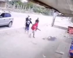 Assassinated on street in front of store