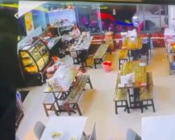 Dude slits his own throat in restaurant