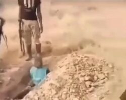 Executed inside shallow desert grave