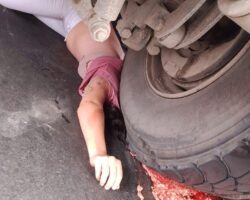 Female biker crushed by heavy truck