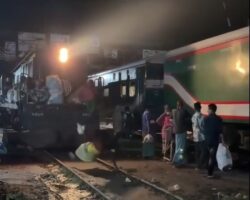 Man slips directly under moving train