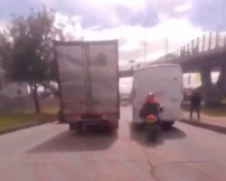 Motorcyclist crashes head-on into stationary bus