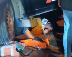 Pedestrian run over in collision between two vehicles