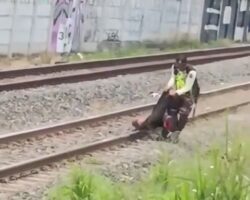 Removing body from train tracks