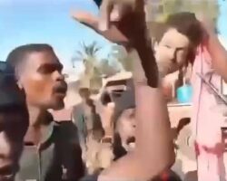 Sudanese fighters celebrate death of their enemy