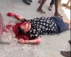 Two men gunned down by masked hitman