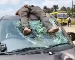 Aftermath of crash between motorcycle and car