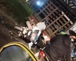 Aftermath of motorcycle collision with truck