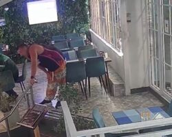 Australian tourist bled to death after running through glass doors