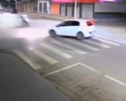 Biker crashes at full speed into turning car