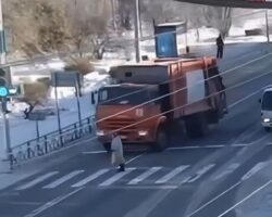 Female pedestrian hit and killed by garbage truck