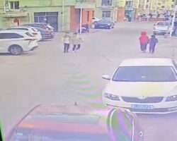 Lady behind wheel crushes two people while reversing
