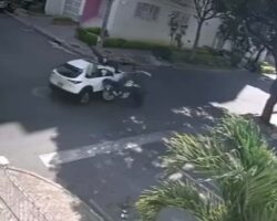 Motorcyclist catapulted into streetlight pole