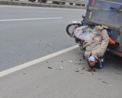 Motorcyclist trapped in truck after crash