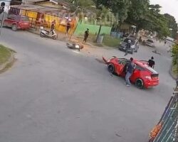 Violent collision between motorcycle and car