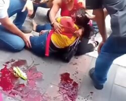 Woman carrying child killed by stray bullet from officer