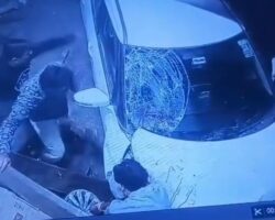 Car pins guy against wall