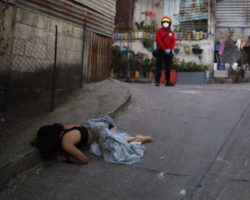 Dead body of young woman found in side alley