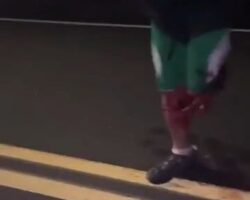 Guy without leg in the middle of nighttime street