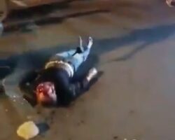 Hitman stoned to death and set on fire