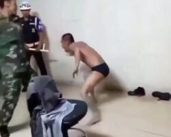 Indonesian soldier whipping fraudster