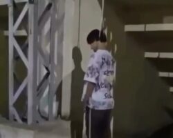 Man hangs himself from elevated railing