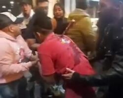 Waiter left with knife in back