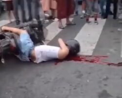 Man murdered by hitman, woman shot by stray bullet