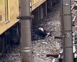 Slowly dying Japanese man cut in half by train