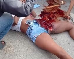 Three on motorcycle struck by garbage truck