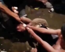 Gangsters eliminating two of their enemies by strangulation