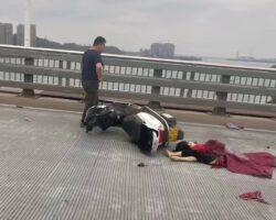 Female scooter driver crushed by concrete mixer truck