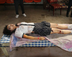 Initial examination of dead Chinese woman #2