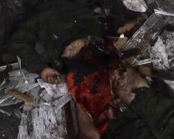 Russian soldier’s destroyed body under rubble of building