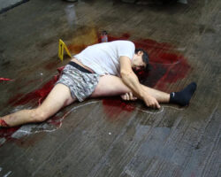 Suicidal jumper after impact from roof of skyscraper