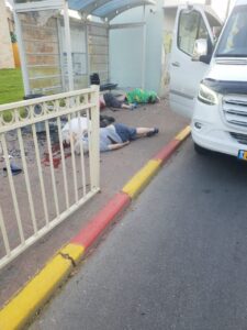 Aftermath of Palestinian terrorist attack on bus stop